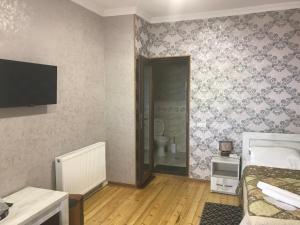 TV o dispositivi per l'intrattenimento presso Hotel Rabath