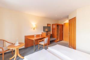 TV o dispositivi per l'intrattenimento presso Hotel Markgraf Leipzig