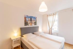 Letto o letti in una camera di Hotel Markgraf Leipzig