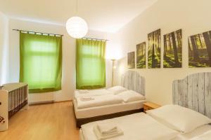 Letto o letti in una camera di Hotel Markgraf Leipzig