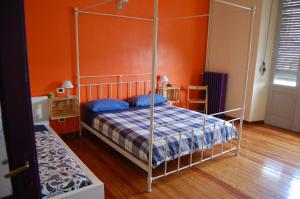 A bed or beds in a room at La Boqueria