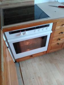 Kuchyň nebo kuchyňský kout v ubytování Haus Zauberwald