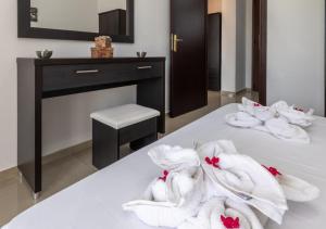 Кровать или кровати в номере Villa Antonis deluxe apartments