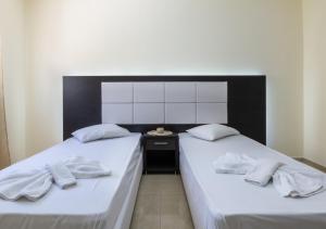 Кровать или кровати в номере Villa Antonis deluxe apartments