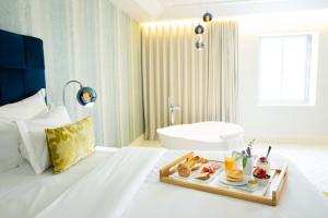 Uma cama ou camas num quarto em Convento do Seixo Boutique Hotel & Spa