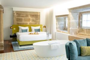 Uma cama ou camas num quarto em Convento do Seixo Boutique Hotel & Spa