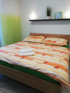 Postel nebo postele na pokoji v ubytování Apartmán Diamond