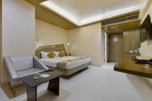 Ένα ή περισσότερα κρεβάτια σε δωμάτιο στο Dragonfly Hotel - The Art Hotel