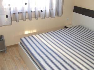 Кровать или кровати в номере Asparuhov Guest Rooms and Apartments