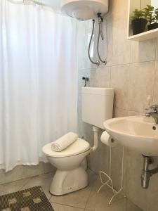 Ванная комната в Apartment & Rooms Riva