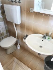 Ванная комната в Apartment & Rooms Riva