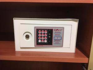 a microwave oven sitting on top of a shelf at Residence Tortorella in Tortoreto Lido