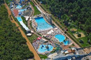 an overhead view of a resort with two pools at RAINBOW in Pula
