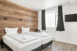 Postel nebo postele na pokoji v ubytování Stay Apartments Einholt