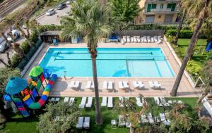 an overhead view of a swimming pool with a slide and a water park at Family Hotel Relax in San Benedetto del Tronto