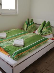 Krevet ili kreveti u jedinici u okviru objekta Ferienhaus Am-moore