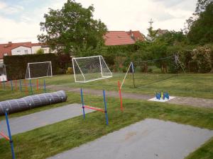 an empty playground with a soccer goal at Ferienwohnung Familie Rudolf in Coswig