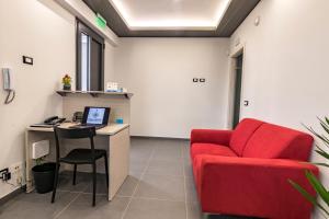 A television and/or entertainment centre at Sicilia Bedda B&B