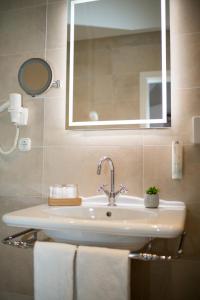 Vannituba majutusasutuses Stadthotel Styria