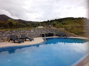 Bazén v ubytovaní Appartamento Leccino con piscina - Riva Trigoso alebo v jeho blízkosti
