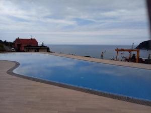 Bazén v ubytovaní Appartamento Leccino con piscina - Riva Trigoso alebo v jeho blízkosti