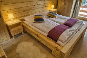 Letto o letti in una camera di Zruby Pod Chopkom