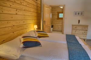 Letto o letti in una camera di Zruby Pod Chopkom