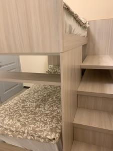 Uma cama ou camas num quarto em Scala Family Home