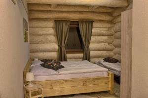 Letto o letti in una camera di Zruby Pod Chopkom