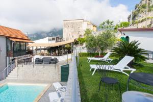 The swimming pool at or close to Lo Smeraldo Private Pool Villa Ravello by ElodeaGroup