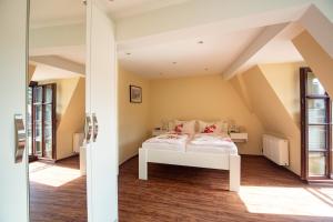 Postel nebo postele na pokoji v ubytování Hotel Mosella