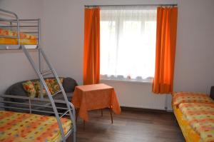 Posteľ alebo postele v izbe v ubytovaní Chalupa Bohunka