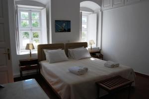 Postelja oz. postelje v sobi nastanitve Hotel Miranda