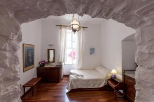 Postelja oz. postelje v sobi nastanitve Hotel Miranda