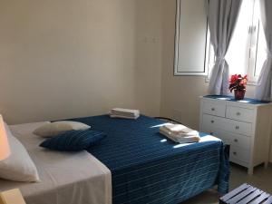 Letto o letti in una camera di Casa Vigna