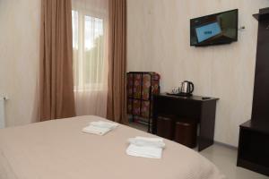 Voodi või voodid majutusasutuse Hotel Like toas