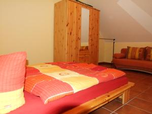 Postel nebo postele na pokoji v ubytování Ferienhaus Am Seeufer