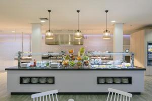 A kitchen or kitchenette at Alua Village Fuerteventura - All Inclusive