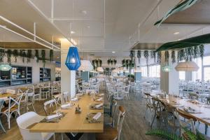 A restaurant or other place to eat at Alua Village Fuerteventura - All Inclusive