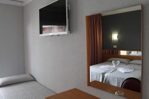 TV a/nebo společenská místnost v ubytování Hotel Reymar Playa