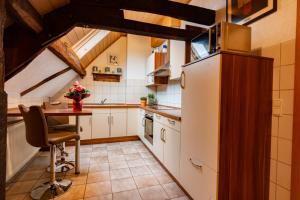 Η κουζίνα ή μικρή κουζίνα στο Ferienwohnung Flämisches Weinhaus +15 φωτογραφίες