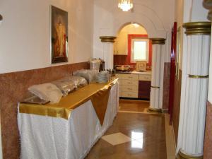 Kuchyň nebo kuchyňský kout v ubytování Hotel Wellness & Spa Angelo Gabriel