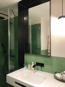 Ett badrum på Eco-lodge Villa Epicurea
