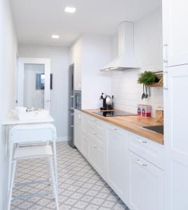 Kuchyň nebo kuchyňský kout v ubytování Apartamento de diseño centrico con terraza espectacular