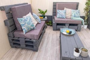 Posezení v ubytování Apartamento de diseño centrico con terraza espectacular