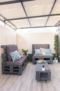 Posezení v ubytování Apartamento de diseño centrico con terraza espectacular