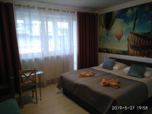 Postel nebo postele na pokoji v ubytování Villa Eleven