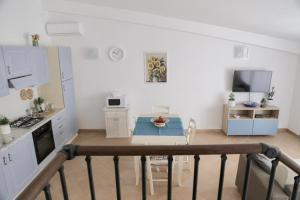 Kuchyň nebo kuchyňský kout v ubytování Casa Diletta