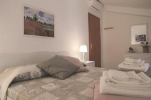 Postel nebo postele na pokoji v ubytování Casa Diletta