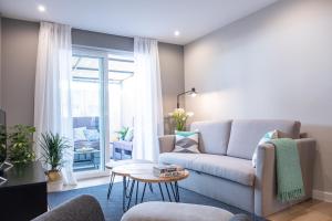 Posezení v ubytování Apartamento de diseño centrico con terraza espectacular
